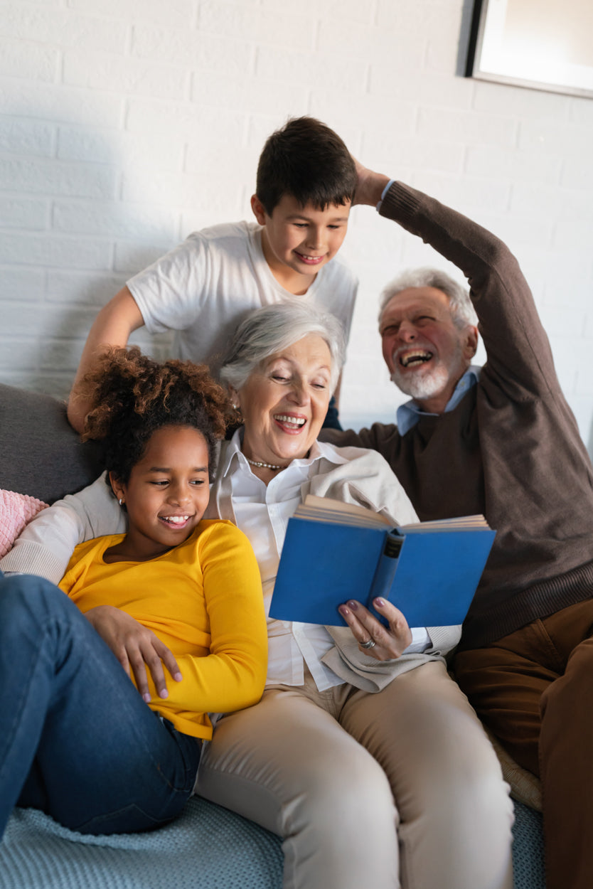 Grandparents spending time with a child at home